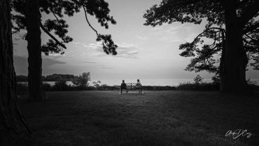 Two women on a bench, Lakeshore